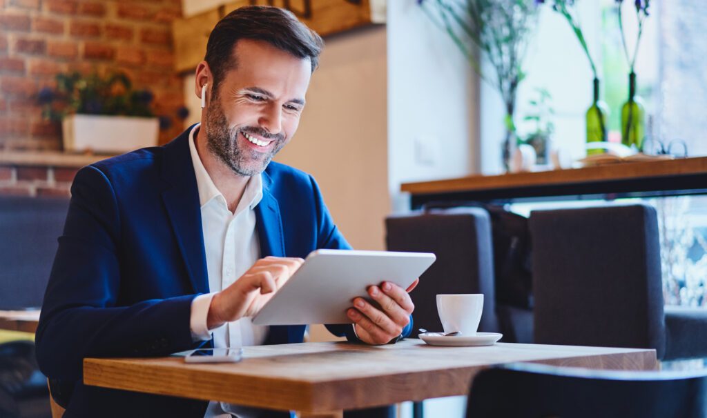 A business owner using wireless technology