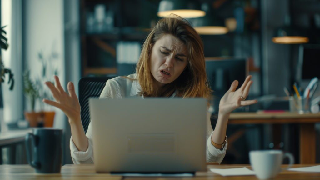 Outsourcing - businessman frustrated while talking with a freelancer online. - Offshoring